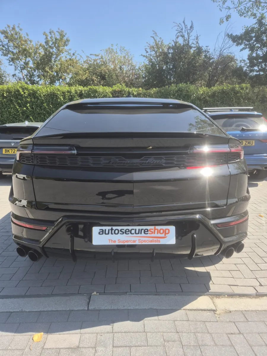 Black Lamborghini Urus two with Autosecureshop branded display plate